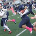 SoHi's Drew Gibbs (28) returns an interception as teammates Jared Chavez (8) blocks and Brooks Furlong (11) help out.  Photo for the Clarion by Michael Dinneen