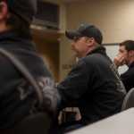 Photo by Rashah McChesney/Peninsula Clarion  CES firefighter Dan Jensen and others listen to a presentation on fires caused during the process of making hash oil, a form of cannabis, and how to fight them Wednesday October 22, 2014 in Soldotna, Alaska.