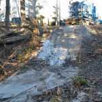 Photo by Rashah McChesney/Peninsula Clarion Certain pools of a greent-tinged cement mixture dumped behind a Baker Hughes contain a foul-smelling, oily liquid in Nikiski, Alaska.