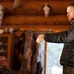 Photo by Rashah McChesney/Peninsula Clarion  Christian de Schweinitz, of Anchorage, talks to a friend about trapping gear during a break from a class on the Kenai National Wildlife Refuge for prospective trappers seeking permits on Saturday October 25, 2014 in Soldotna, Alaska.