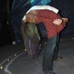 Ben Boettger/Peninsula Clarion Freshman Emilie Fuhrman performs contortions as a demon-possessed player in Soldotna High School Drama Troupe's haunted house fundraiser on Tuesday, October 28, 2014, at the Peninsula Center Mall.