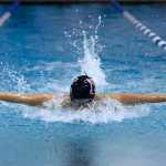 Photo by Rashah McChesney/Peninsula Clarion Kenai's Celestina Castro swims during the 100-yard butterfly competition at the Region III swimming and diving competition Saturday November 1, 2014 in Soldotna, Alaska.