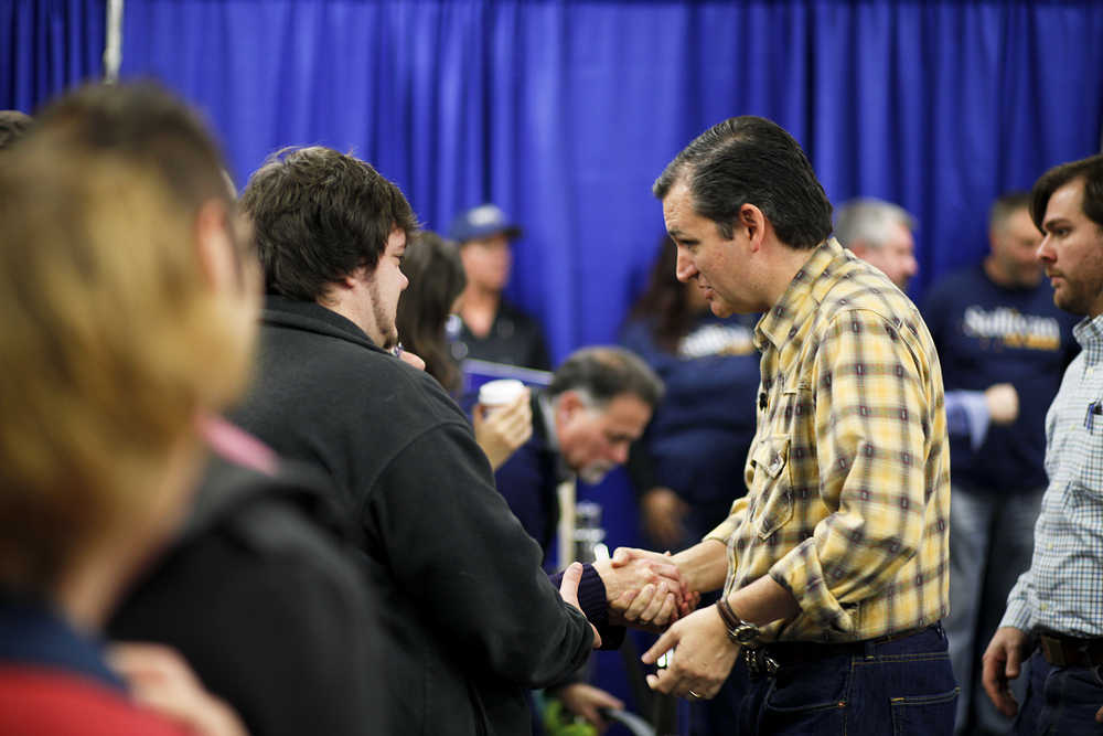 Photo by Rashah McChesney/Peninsula Clarion  Sen. Ted Cruz, R-Texas, greets members of the audience after stumping for Senate Candidate Dan Sullivan Sunday November 11, 2014 in Soldotna, Alaska.