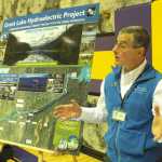 Ben Boettger/Peninsula Clarion  HEA's Manager of Fuel Supply & Renewable Energy Development Mike Salzetti  takes questions about the Grant Lake project during HEA's Energy and Conservation Fair on Nov. 1 at Kenai Middle School