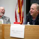 Photo by Rashah McChesney/Peninsula Clarion Candidates for House District 29 Rocky Knudsen and Mike Chenault share a laugh during a Central Kenai Peninsula League of Women Voters debate on Thursday Oct. 30, 2014 in Soldotna, Alaska.