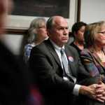 Photo by Rashah McChesney/Peninsula Clarion  Gubernatorial candidate Bill Walker watches a Central Peninsula League of Women Voters candidate debate on Thursday Oct. 30, 2014 in Soldotna, Alaska.