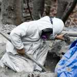 Photo by Rashah McChesney/Peninsula Clarion Several bags containing a cement mixture being pumped out of the nearby woods line an area at a Baker Hughes facility, on Wednesday November 5, 2014 in Nikiski, Alaska. The company is working to clean up several thousand pounds of concrete material it dumped into the woods over the course of several weeks.