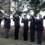 Photo by Dan Balmer/Peninsula Clarion Members of the Kenai American Legion Post 20 perform a 21-gun salute after posting of the colors Monday at the Kenai Senior Center. The community gathered for a salute to veterans the day before Veteran's Day.