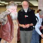 Photo by Dan Balmer/Peninsula Clarion Kenai resident Mary Quesnel stands for the Pledge of Allegiance at a veterans ceremony Monday, Nov. 10, 2014 at the Kenai Senior Center. Quesnel, 93, served as an Army nurse overseas during World War II until the war ended in 1945.