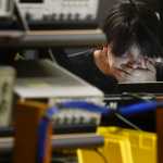 Photo by Rashah McChesney/Peninsula Clarion  Carl Hatten, a Kenai Peninsula College - Kenai River campus, student calibrates a pneumatic control valve for a conference in Anchorage on Wednesday Nov. 11, 2014 in the Career and Technical Education Center in Soldotna, Alaska.