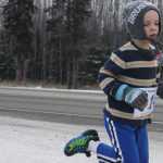 Photo by Kelly Sullivan/ Peninsula Clarion runs on the Unity Trail during the T200 Turkey Trot 5k and 10k Run, Friday, Nov. 28, 2014, at the Soldotna Regional Sports Complex in Soldotna, Alaska. Tsalteshi Trails Association teamed up Tustumena 200 Sled Dog Race for this year's fourth annual event.