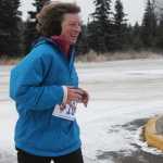 Photo by Kelly Sullivan/ Peninsula Clarion Jane Fuerstenau ran the Unity Trail for the T200 Turkey Trot 5k and 10k Run, Friday, Nov. 28, 2014, at the Soldotna Regional Sports Complex in Soldotna, Alaska. Tsalteshi Trails Association teamed up Tustumena 200 Sled Dog Race for this year's fourth annual event.