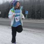 Photo by Kelly Sullivan/ Peninsula Clarion runs on the Unity Trail during the T200 Turkey Trot 5k and 10k Run, Friday, Nov. 28, 2014, at the Soldotna Regional Sports Complex in Soldotna, Alaska. Tsalteshi Trails Association teamed up Tustumena 200 Sled Dog Race for this year's fourth annual event.
