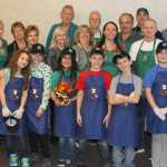 Hilcorp employees treat Kenai Seniors to pre-Thanksgiving dinner