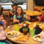 Hilcorp employees treat Kenai Seniors to pre-Thanksgiving dinner