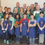 Hilcorp employees treat Kenai Seniors to pre-Thanksgiving dinner