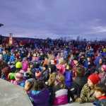 Photo by Rashah McChesney/Peninsula Clarion  Santa Claus found himself swarmed by children after a mentioned that he had a few minutes for hugs immediately following a tree-lighting ceremony at Soldotna Creek Park on Saturday Dec. 6, 2014 in Soldotna, Alaska.
