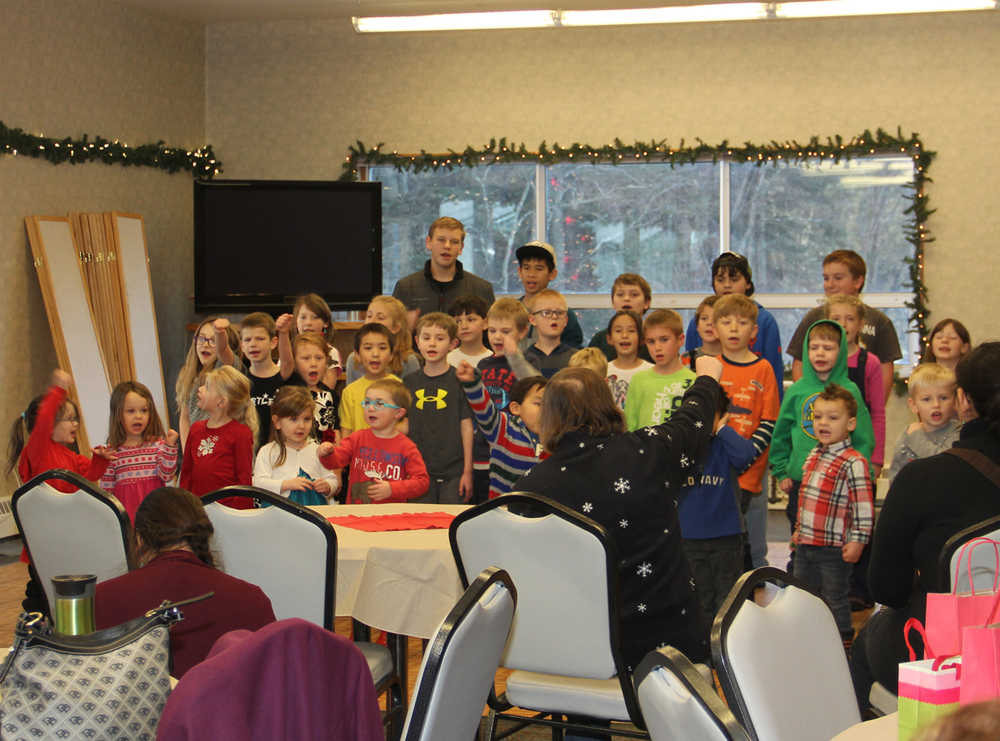 Keeping a 20-year-old tradition Cook Inlet Academy students go caroling in Kenai