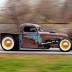 Peter Duvaloois drives his Rat Rod near his shop on Tuesday, Nov. 11, 2014, in Saugerties, N.Y. (AP Photo/Mike Groll)