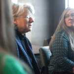 Photo by Kelly Sullivan/ Peninsula Clarion Compassionate Friends of the Kenai Peninsula steering committee member Vickie Herrmann listens to as Leslie Boyd discusses the details of the first candle lighting vigil the group hosted at Christ Lutheran Church Sunday evening on Saturday, Dec. 20, 2014 at the Joyce K. Carver Soldotna Public Library in Soldotna, Alaska. Vickie Herrmann's daughter Jenna Herrmann died in an automobile accident less than three years ago, she said. "Jenna was a sweet soul and she loved children, she loved holidays," Vickie Herrmann said. "Like a lot of young people struggled to find her way, and she is just very deep part of who I am still to this day."
