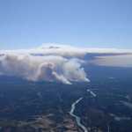 Photo by Rashah McChesney/Peninsula Clarion Smoke from the Funny River Fire reached more than 8,000 feet in the air Tuesday May 20, 2014 as the fire burned more than 7,000 acres of Kenai National Wildlife Refuge land in 24 hours. The line of fire stretched more than 10 miles long from Funny River Road to Tustumena Lake on the Kenai Peninsula.