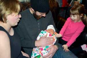 Photo by Dan Balmer/Peninsula Clarion JoAnna Ray Hadassah Chatham, born on Jan. 2, was the first baby born at Central Peninsula Hospital in 2015. JoAnna is the second child for Issac and Amber Chatham of Soldotna. Their firstborn daughter Mary-Katherine Chatham, 4, is on the right.