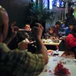 Photo by Rashah McChesney/Peninsula Clarion  Mark Wackler, a guide with Fishology Alaska and Vice President of the Kenai Peninsula Chapter of Trout Unlimited shows an audience how to make a flesh-patterned fly on Tuesday Jan. 6, 2014 at the Main Street Tap & Grill in Kenai, Alaska.