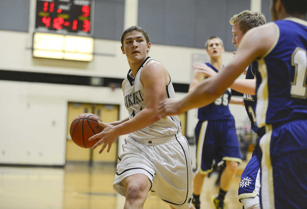 Photo by Rashah McChesney/Peninsula Clarion Nikiski's Luke Johnson catches a pass during their game Homer on Saturday Jan. 10,  2015 at Nikiski Middle-High School in Nikiski, Alaska.