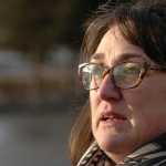 Photo by Rashah McChesney/Peninsula Clarion France Bennett, of Anchorage, hugs her Wheaten terrier mix Didley after Soldotna resident Amanda Burg returned the dog on Thursday Jan. 15, 2014 in Sterling, Alaska. Bennett lost Didley on Jan. 10 and after an extensive search, Kenai Peninsula residents located the errant dog, trapped him, and returned him to his owners.