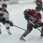 Maurin Bouvet of Kenai guards Ethan Somoza of Fairbanks during a hockey game at the Soldotna Regional Sports Complex on Friday Jan. 16.