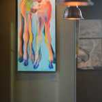 Photo by Rashah McChesney/Peninsula Clarion "Lanky Calves," by artist Kaitlin Vadla, on display at The Flats Bistro in Kenai, Alaska.