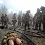 Photo by Rashah McChesney/Peninsula Clarion  Central Emergency Services firefighters head into a burning training building Wednesday August 6, 2014 in Soldotna, Alaska.