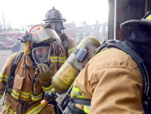 Photo by Rashah McChesney/Peninsula Clarion Firefighters queue outside of a new Central Emergency Services training facility Wednesday August 6, 2014 in Soldotna, Alaska.