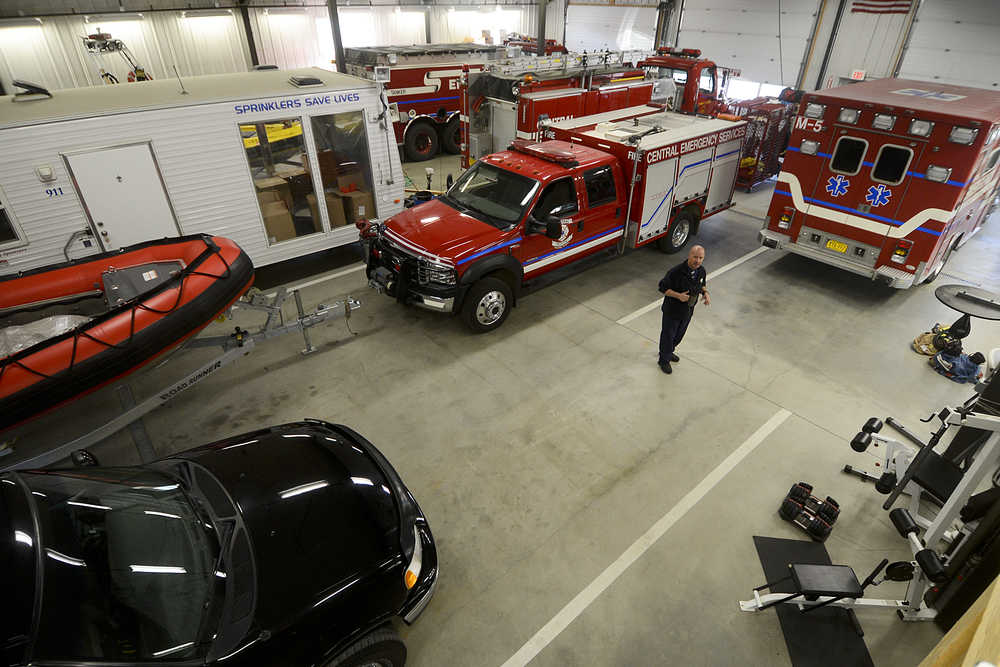 Photo by Rashah McChesney/Peninsula Clarion Central Emergency Services firefighter Sam Evanoff runs through his morning routine at the Funny River Fire Station on May 1, 2014 in Funny River, Alaska. CES has struggled to maintain staffing at its () stations and Evanoff worked a shift alone at the remote station. The department recently launched a volunteer program which aims to triple its volunteer base and add more people on each shift to its outlying stations.
