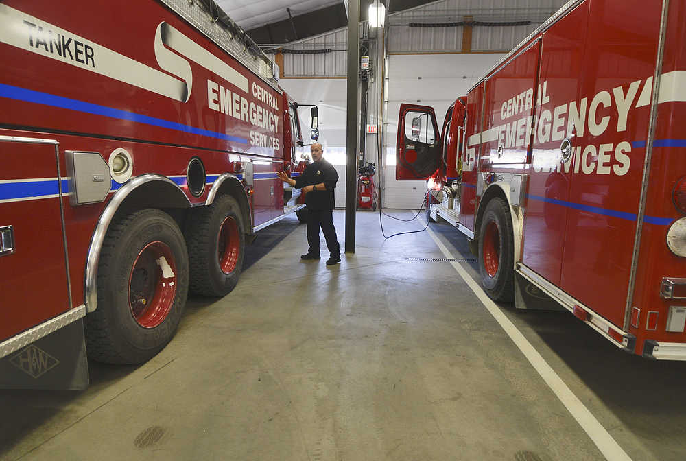 Photo by Rashah McChesney/Peninsula Clarion Central Emergency Services firefighter Sam Evanoff runs through his morning routine at the Funny River Fire Station on May 1, 2014 in Funny River, Alaska. CES has struggled to maintain staffing at its () stations and Evanoff worked a shift alone at the remote station. The department recently launched a volunteer program which aims to triple its volunteer base and add more people on each shift to its outlying stations.
