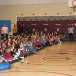 Brad Nelson of CES talk's safety to kids at Redoubt Elementary.