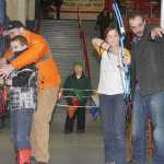 Sportsmen's Warehouse volunteer's man archery booth at Winter Games.