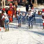 Photo by Joey Klecka/Peninsula Clarion Soldotna junior Levi Michael (No. 40) leads a pack of skiers at the start of Friday's boys varsity race at the Kenai Peninsula Borough ski championships, held at the Tsalteshi Trails in Soldotna.