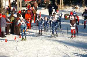 Photo by Joey Klecka/Peninsula Clarion Soldotna junior Levi Michael (No. 40) leads a pack of skiers at the start of Friday's boys varsity race at the Kenai Peninsula Borough ski championships, held at the Tsalteshi Trails in Soldotna.