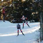 Photo by Joey Klecka/Peninsula Clarion Kenai Central freshmen Addison Gibson and Riana Boonstra crest a hill on their way to completing the first lap of Friday's Kenai Peninsula Borough ski championships, held at the Tsalteshi Trails in Soldotna.