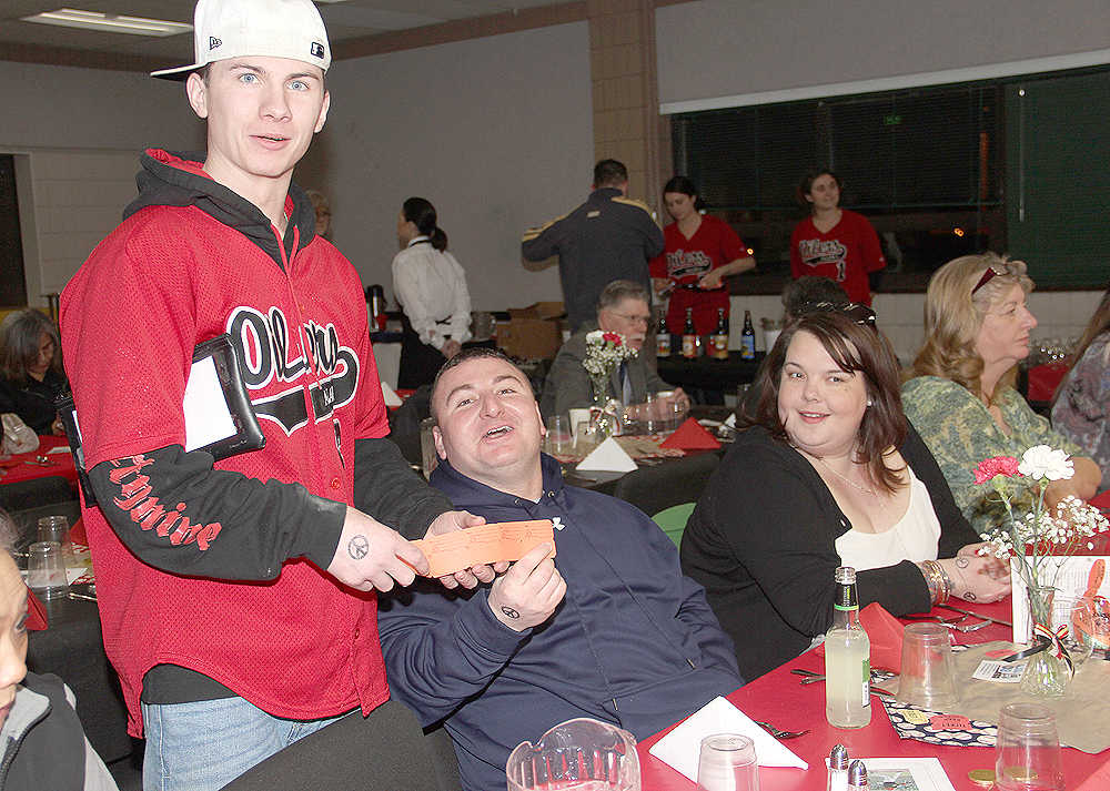 Oiler fans buy split the pot tickets and donate their winnings back to the team