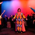 Ben Boettger/Peninsula Clarion Lester Steward as Joseph performing with the children's choir in a dress rehearsal for "Joseph and the Amazing Technicolor Dreamcoat" at the Kenai Central High School auditorium on Tuesday, Feb. 17.