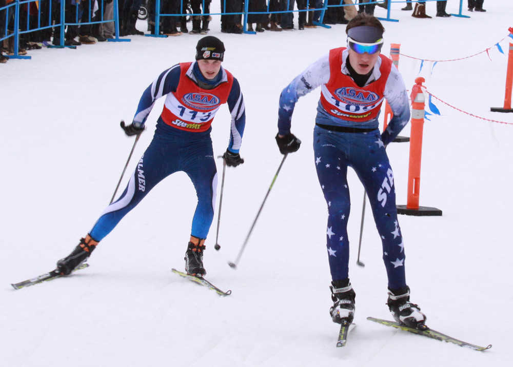 Photo by Caitlin Skvorc/Frontiersman.com Palmer's Colbe Hand and Soldotna's John-Mark Pothast duel during the first leg of the boys 4-by-5-kilometer relay Saturday at the state Nordic ski championships at Kincaid Park in Anchorage. Pothast finished the first leg in 11th place, while Hand was 14th.