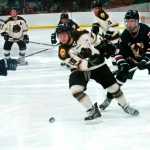 Photo by Ben Boettger/Peninsula Clarion Brown Bears forward Zack Zulkanycz bulls his way through the Tomahawks defense Friday at the Soldotna Regional Sports Complex.