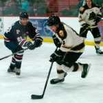 Ben Boettger/Peninsula Clarion Brown Bears forward Adam Kresl carries the puck Friday against the Johnstown (Pennsylvania) Tomahawks at the Soldotna Regional Sports Complex.