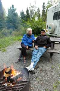 Clarion file photo Clarion file photo Kay and Howard Imsande of Brainerd, Minn., enjoy a campfire next to their RV in Centennial Campground in Soldotna in 2007. Tourism officials are expecting low gas prices to bring more RV traffic to Alaska this season.