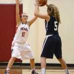 Photo by Rashah McChesney/Peninsula Clarion Kenai's Cori Holmes defends against Soldotna's Skylar Shaw during their game on Saturday Feb. 28, 2015 in Kenai, Alaska. Soldotna won the game 40-35.
