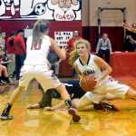 Photo by Rashah McChesney/Peninsula Clarion  Kenai Central High School's audience quietly cheer for a Kenai player during a foul shot at the Northern Light's Basketbal Tournament  on Thursday March 5, 2015 in Kenai, Alaska.
