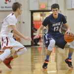 Photo by Rashah McChesney/Peninsula Clarion  Kenai's Hannah Drury stops to change direction during a game against Soldotna for the Northern Lights basketball tournament on Thursday March 5, 2015 in Kenai, Alaska.