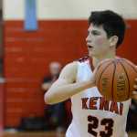 Photo by Rashah McChesney/Peninsula Clarion Kenai's  Allie Ostrander takes a pass from Alli Steinbeck during their game against Soldotna for the 2015 Northern Lights Basketball tournament on Kenai, Alaska.